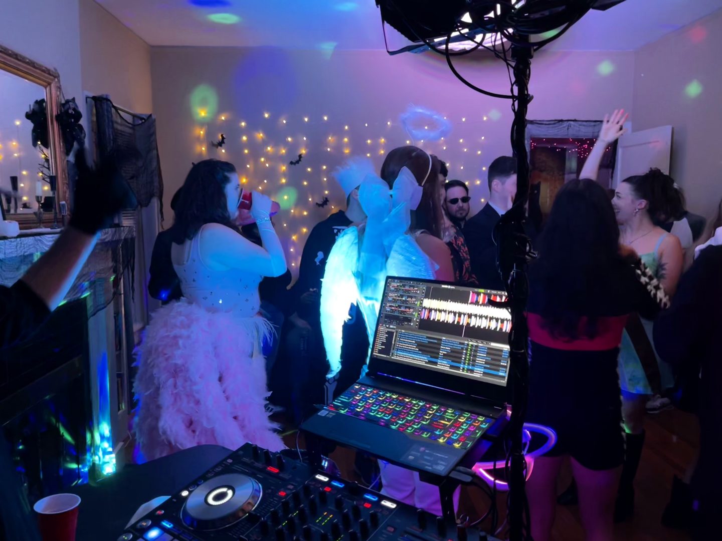 A view from the DJ equipment toward the party floor